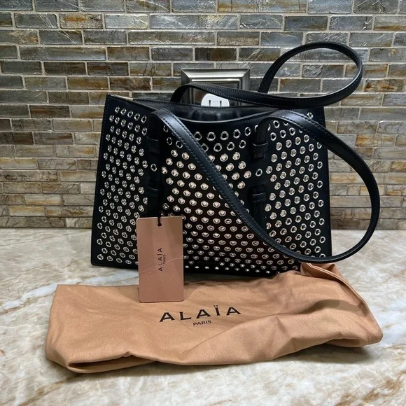 ALAÏA Mina Small perforated leather tote bag - Picture 8 of 14